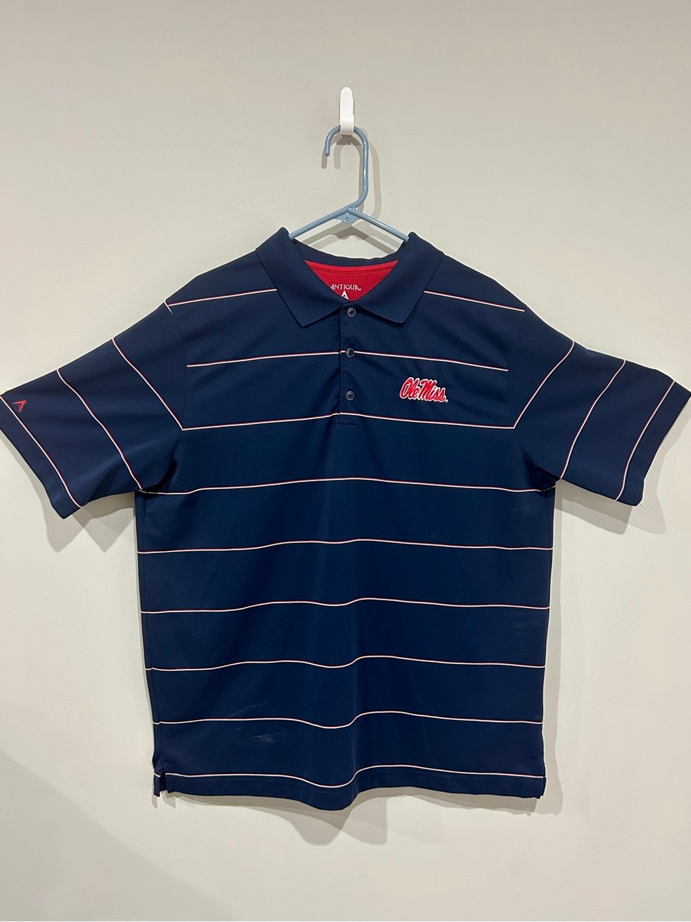 Ole Miss Antigua Navy and Red Performance Polo